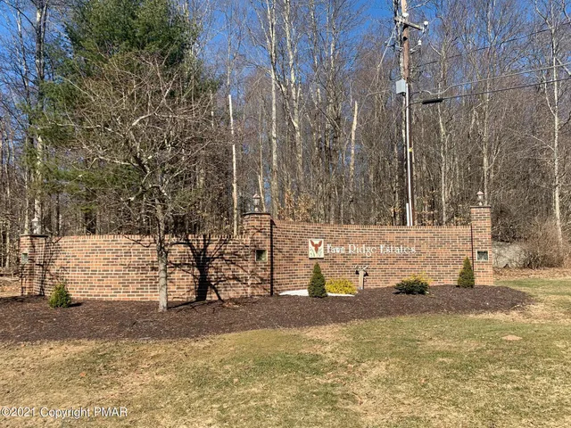 a view of yard covered with snow