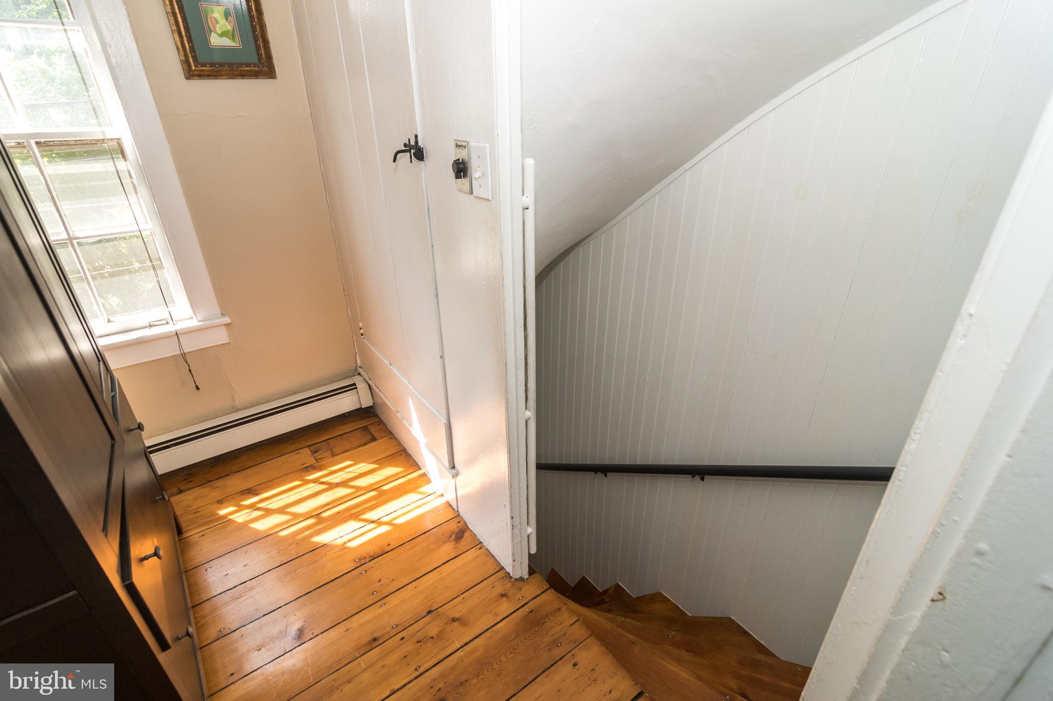 7445 Swagger Road New Hope, PA 18938 - Photo 16 of 24 Upstairs Hallway and "Winder Stairs"