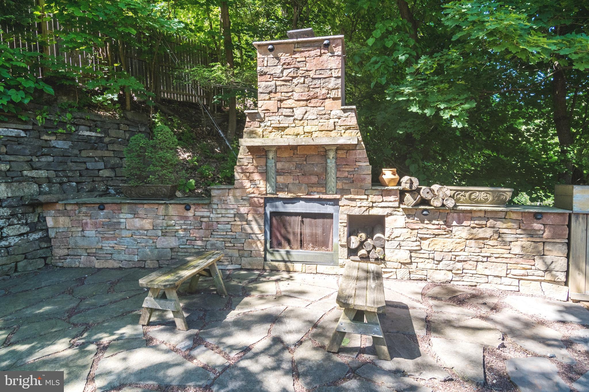 7445 Swagger Road New Hope, PA 18938 - Photo 22 of 24 Patio/Deck stone Fireplace