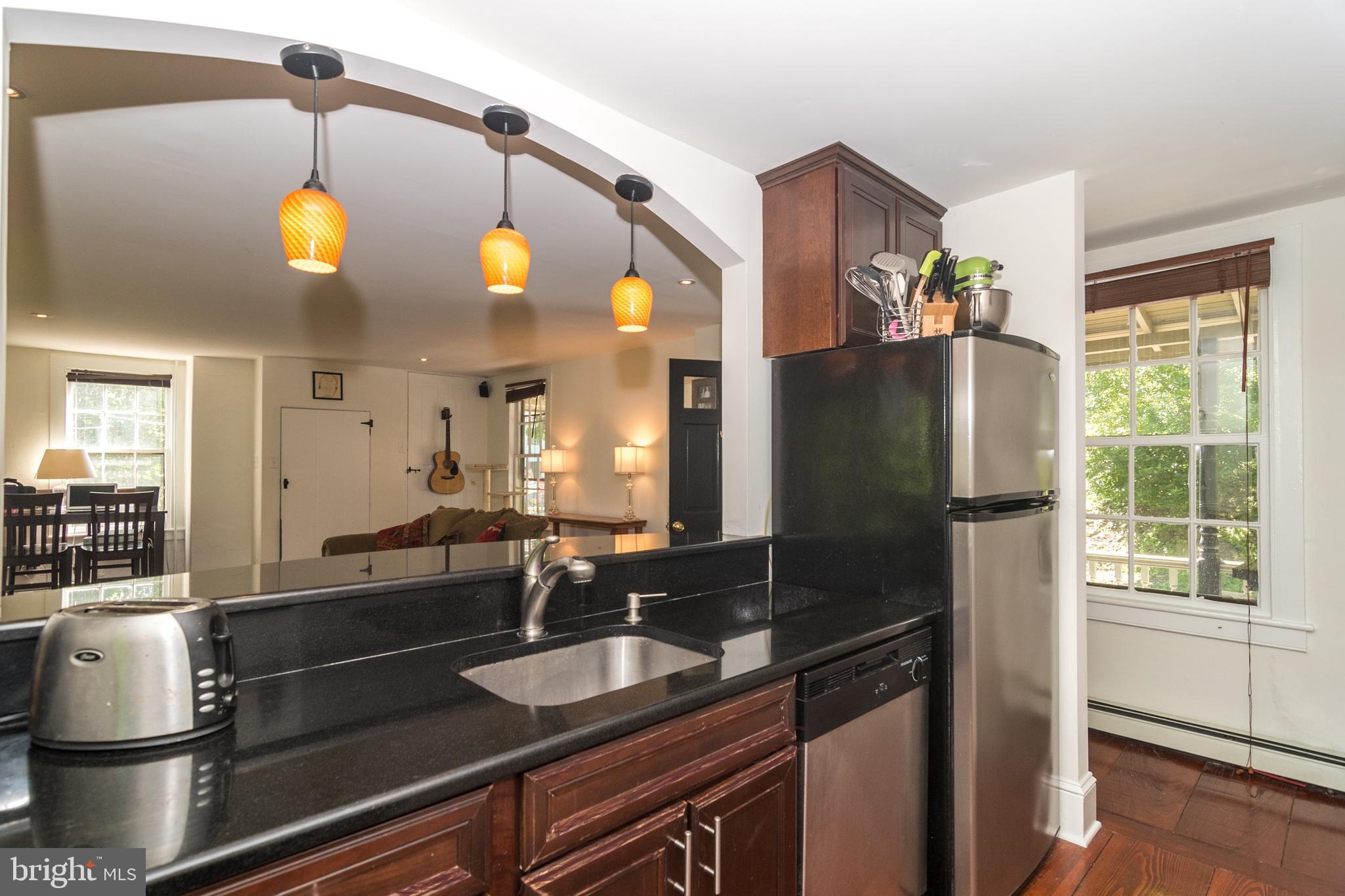 7445 Swagger Road New Hope, PA 18938 - Photo 10 of 24 Galley Kitchen w/SS Appliances