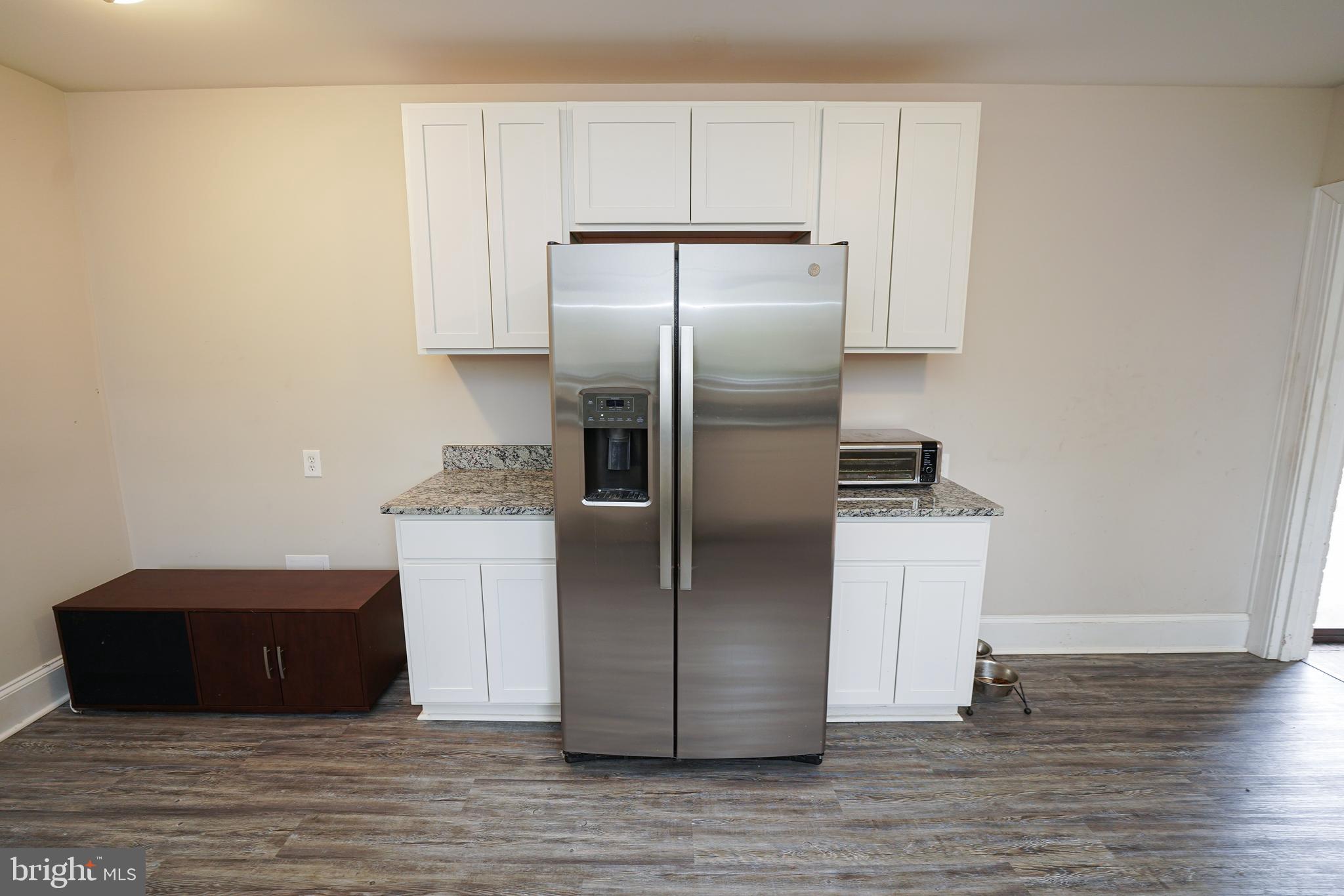 215 Pine Bluff Road Salisbury, MD 21801 - Photo 21 of 75 a kitchen with stainless steel appliances a refrigerator and a stove