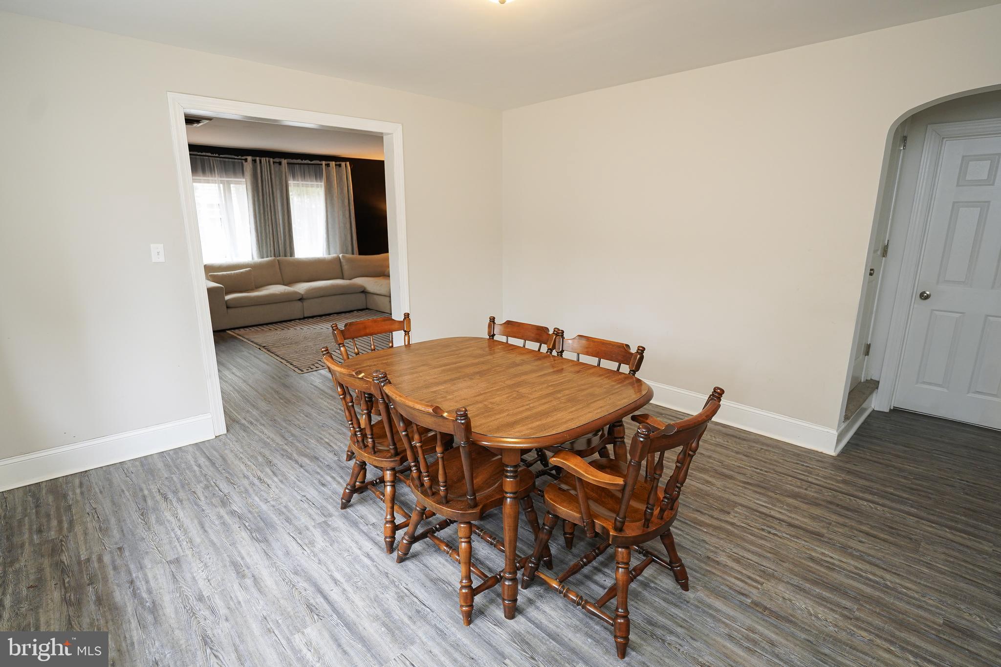 215 Pine Bluff Road Salisbury, MD 21801 - Photo 25 of 75 a dining room with furniture and wooden floor