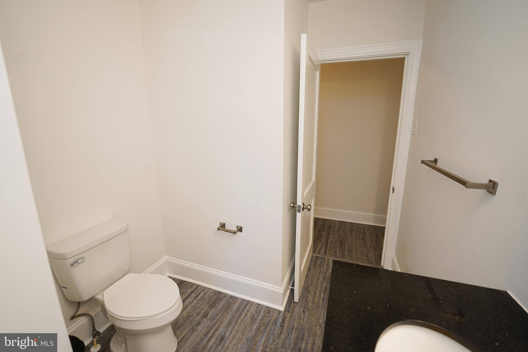 215 Pine Bluff Road Salisbury, MD 21801 - Photo 44 of 75 a white toilet sitting next to a shower
