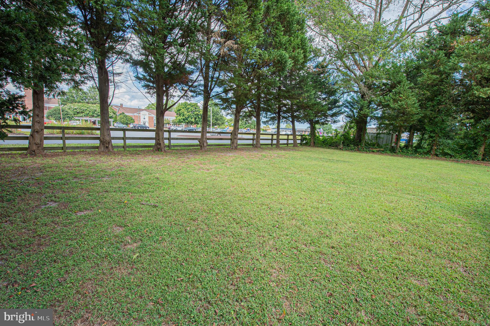 215 Pine Bluff Road Salisbury, MD 21801 - Photo 66 of 75 a view of outdoor space with deck and trees