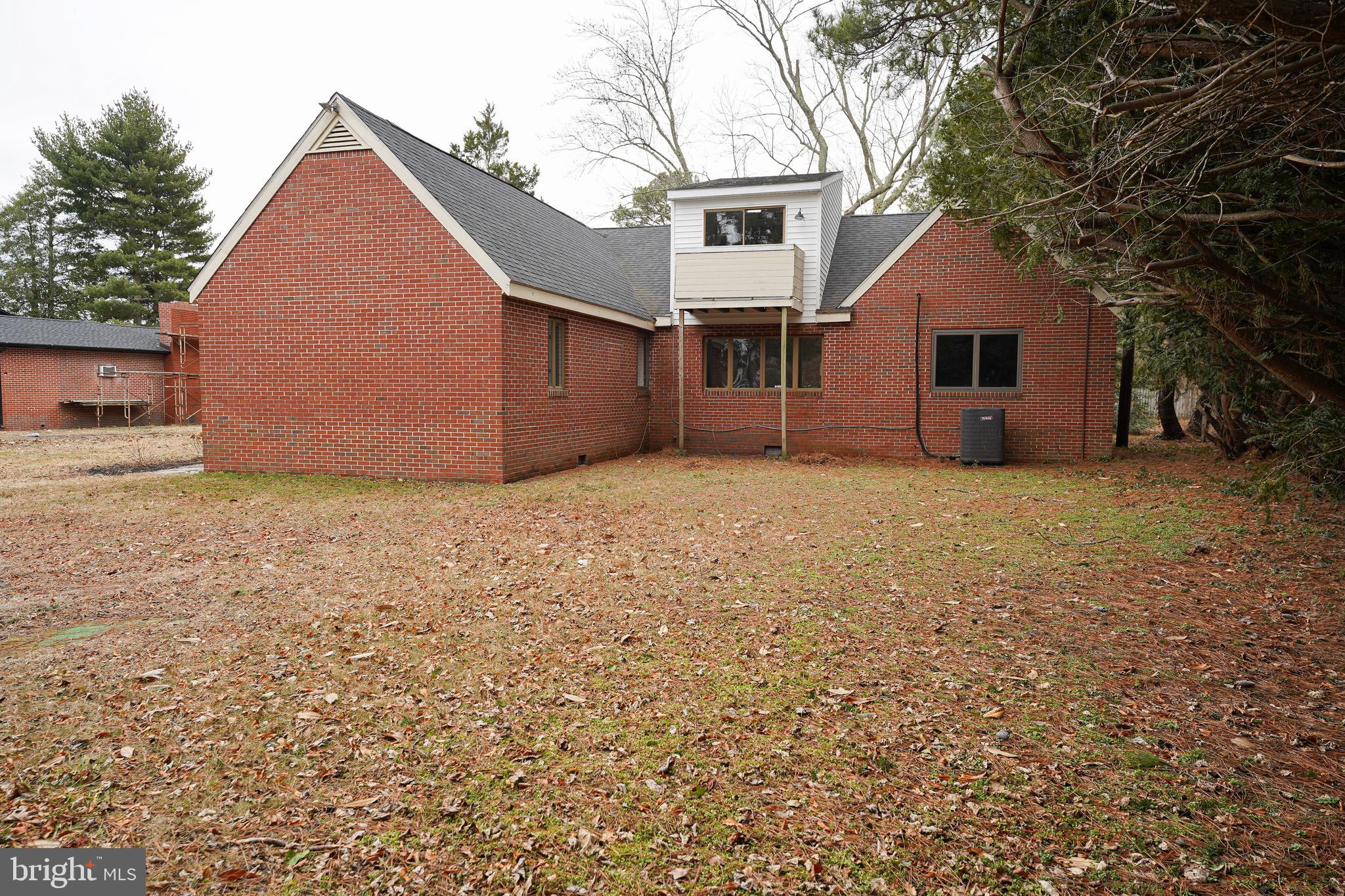 215 Pine Bluff Road Salisbury, MD 21801 - Photo 72 of 75 a front view of a house with a yard