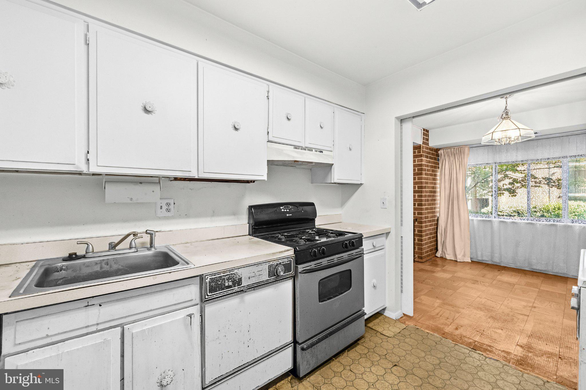2103 Walsh View Terrace, Unit 102 Silver Spring, MD 20902 - Photo 14 of 30 Charming kitchen with vintage appeal.