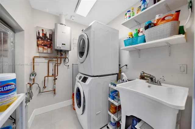 a utility room with dryer and washer