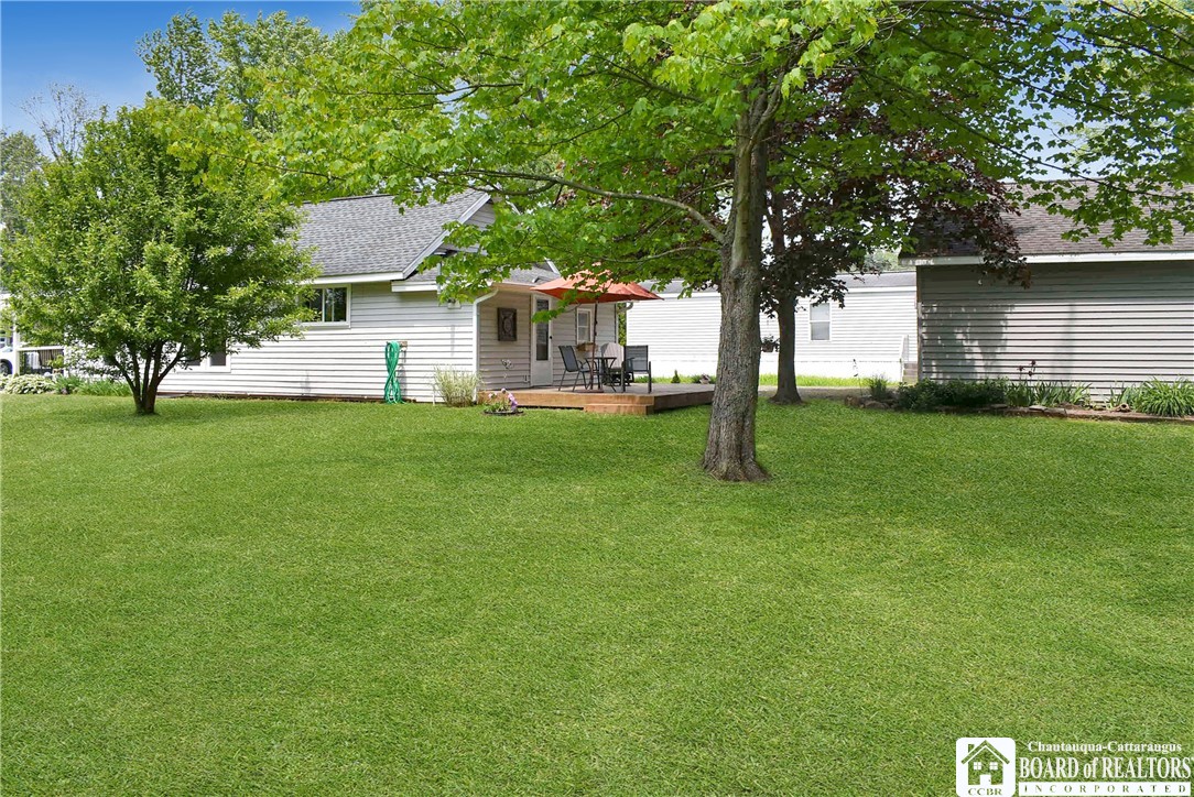 3938 South Ralph Avenue Ellery, NY 14712 - Photo 5 of 20 side view of Home and Garage