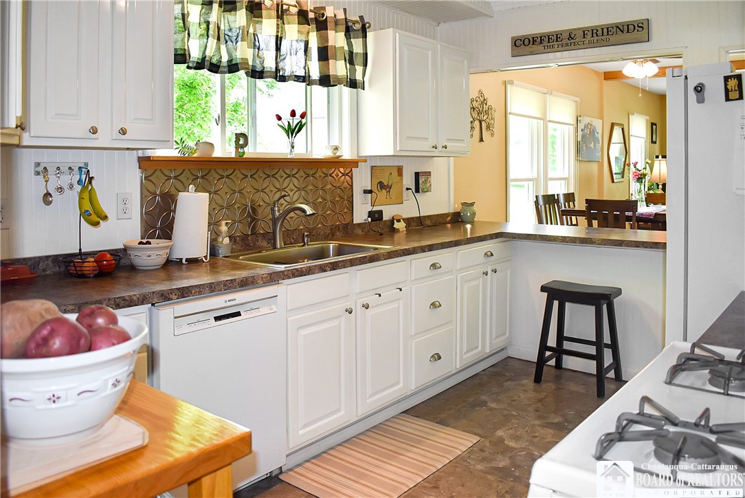 3938 South Ralph Avenue Ellery, NY 14712 - Photo 8 of 20 Breakfast bar between Dining area and Kitchen