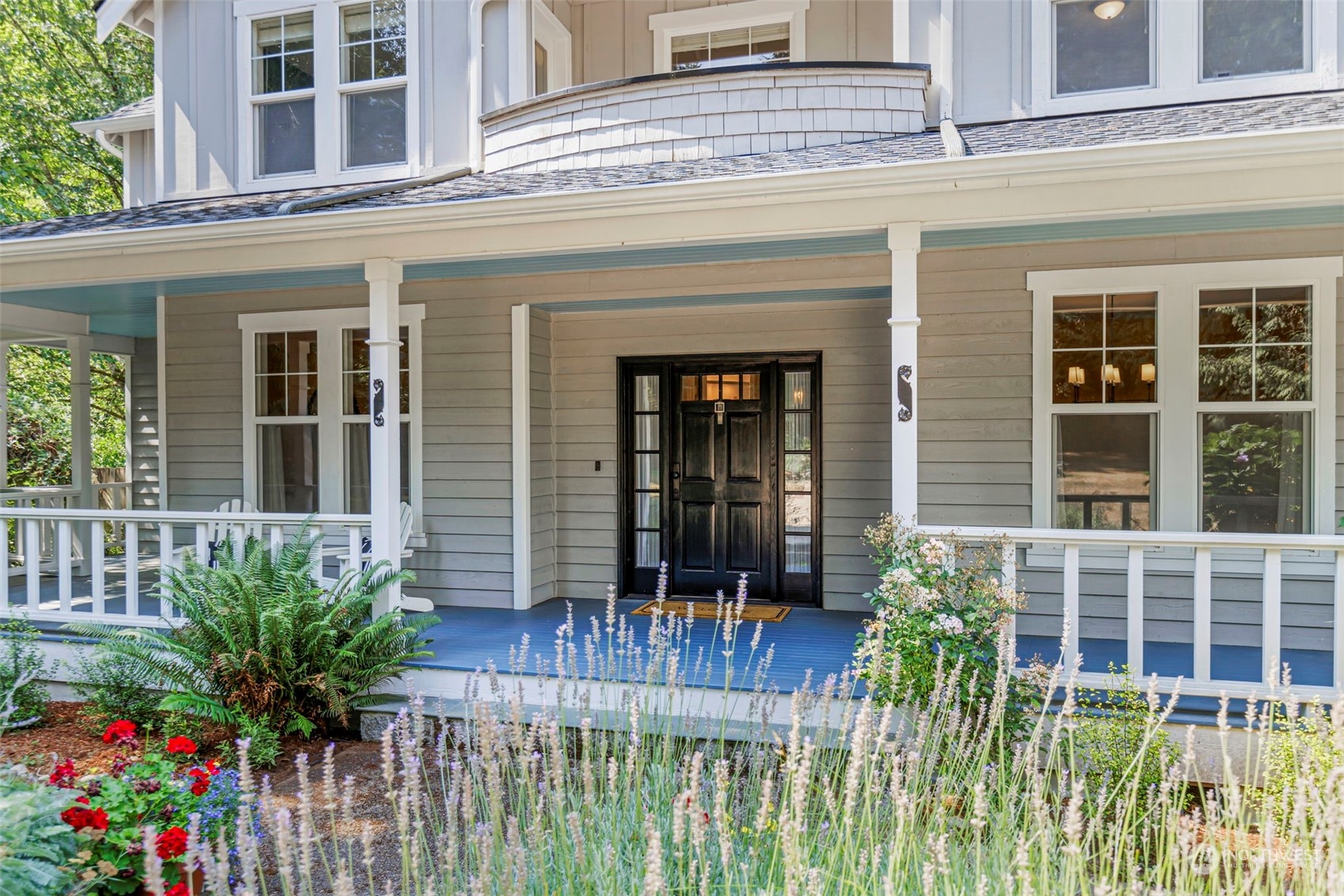 6457 Haley Loop Road Northeast Bainbridge Island, WA 98110 - Photo 2 of 40 front view of house with potted plant of flower