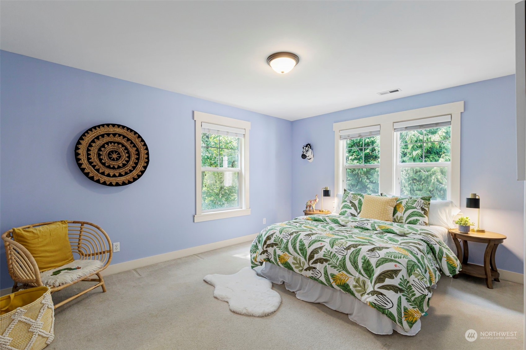 6457 Haley Loop Road Northeast Bainbridge Island, WA 98110 - Photo 25 of 40 a bedroom with a bed and a window