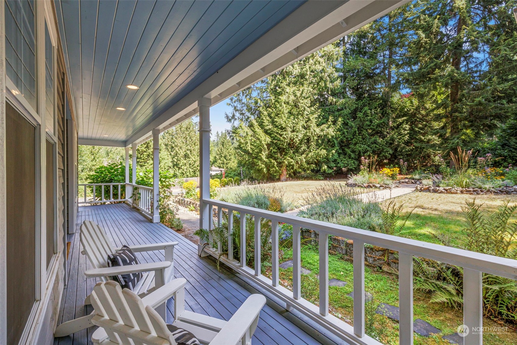 6457 Haley Loop Road Northeast Bainbridge Island, WA 98110 - Photo 3 of 40 a view of balcony with deck and wooden floor
