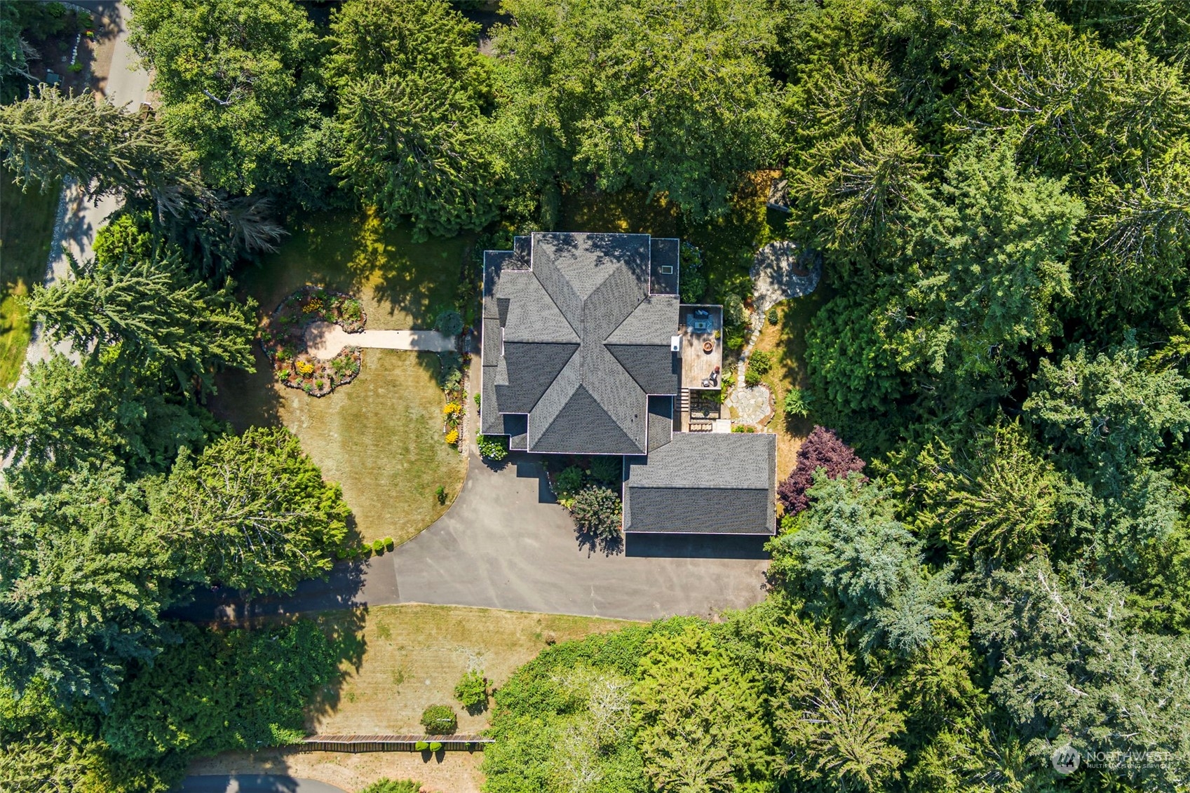6457 Haley Loop Road Northeast Bainbridge Island, WA 98110 - Photo 38 of 40 an aerial view of a house with swimming pool and garden space