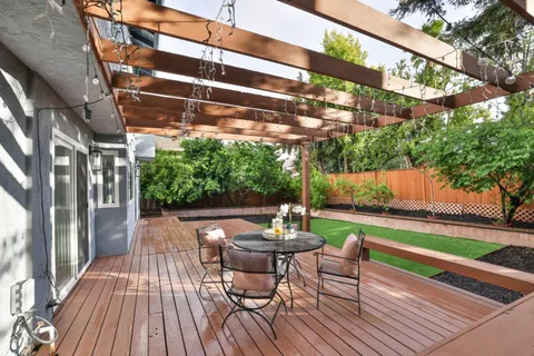 a view of swimming pool with a patio