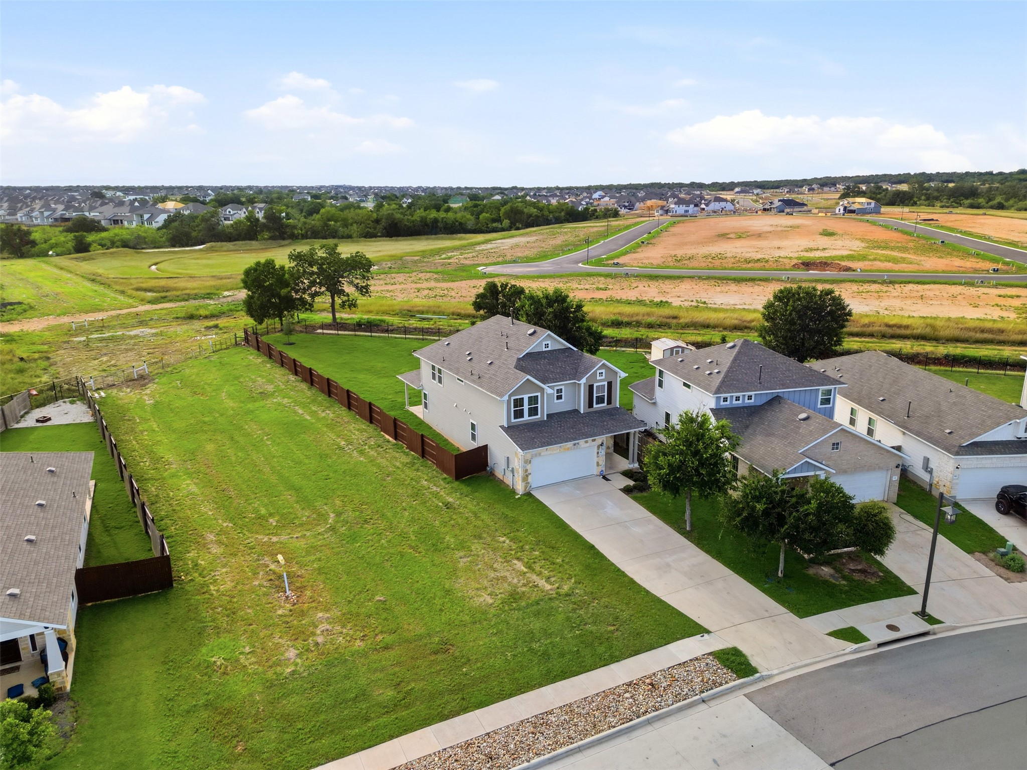 60 Bent Trl Lane Georgetown, TX 78628 - Photo 2 of 40 A quiet neighborhood with ample green space and a mix of completed and developing properties.