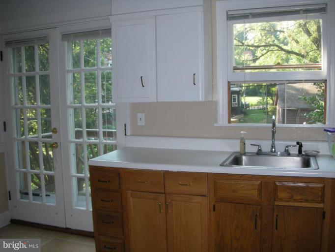 635 Deepdene Road Baltimore, MD 21210 - Photo 6 of 11 a kitchen with a sink and a window