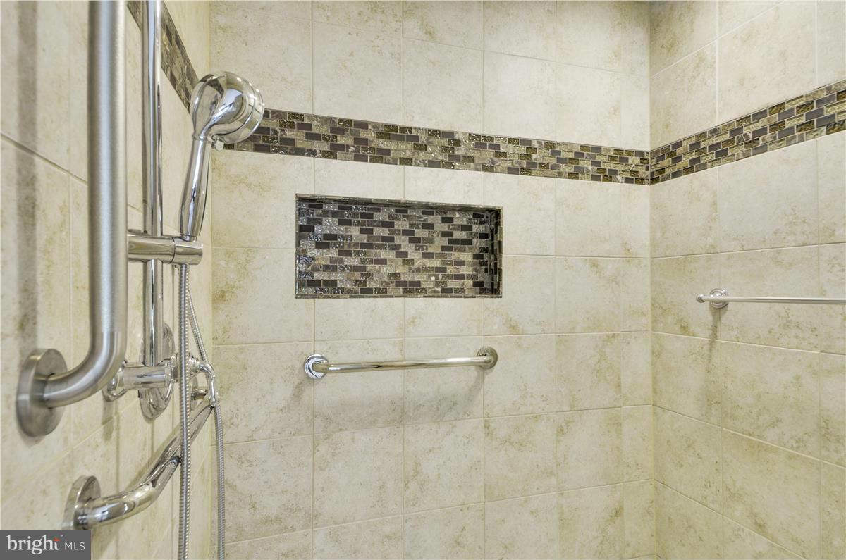 2117 Apple Tree Lane Silver Spring, MD 20905 - Photo 17 of 30 a bathroom with a shower