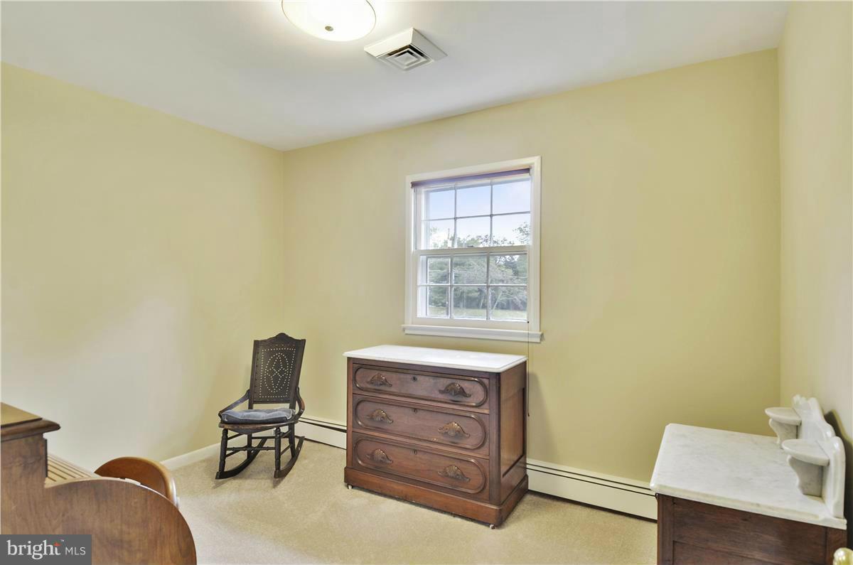 2117 Apple Tree Lane Silver Spring, MD 20905 - Photo 19 of 30 a view of workspace with furniture and window