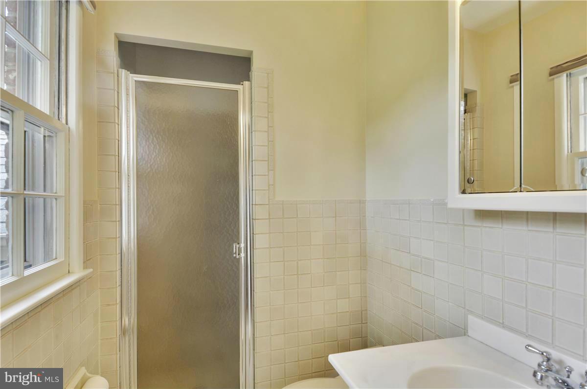 2117 Apple Tree Lane Silver Spring, MD 20905 - Photo 24 of 30 a bathroom with a shower