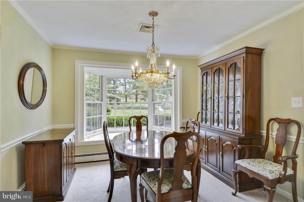 2117 Apple Tree Lane Silver Spring, MD 20905 - Photo 8 of 30 a view of a dining room with furniture window and outside view