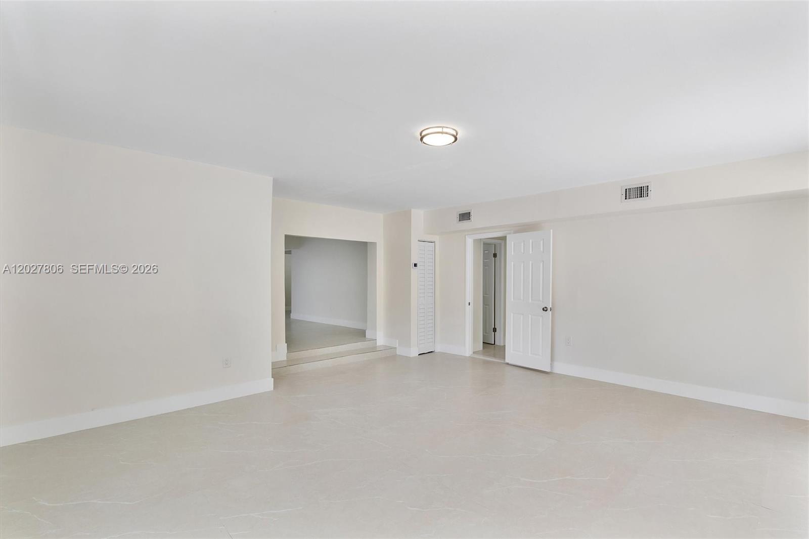 1612 Southwest 23rd Street, Unit 1612 Miami, FL 33145 - Photo 19 of 42 a view of an empty room