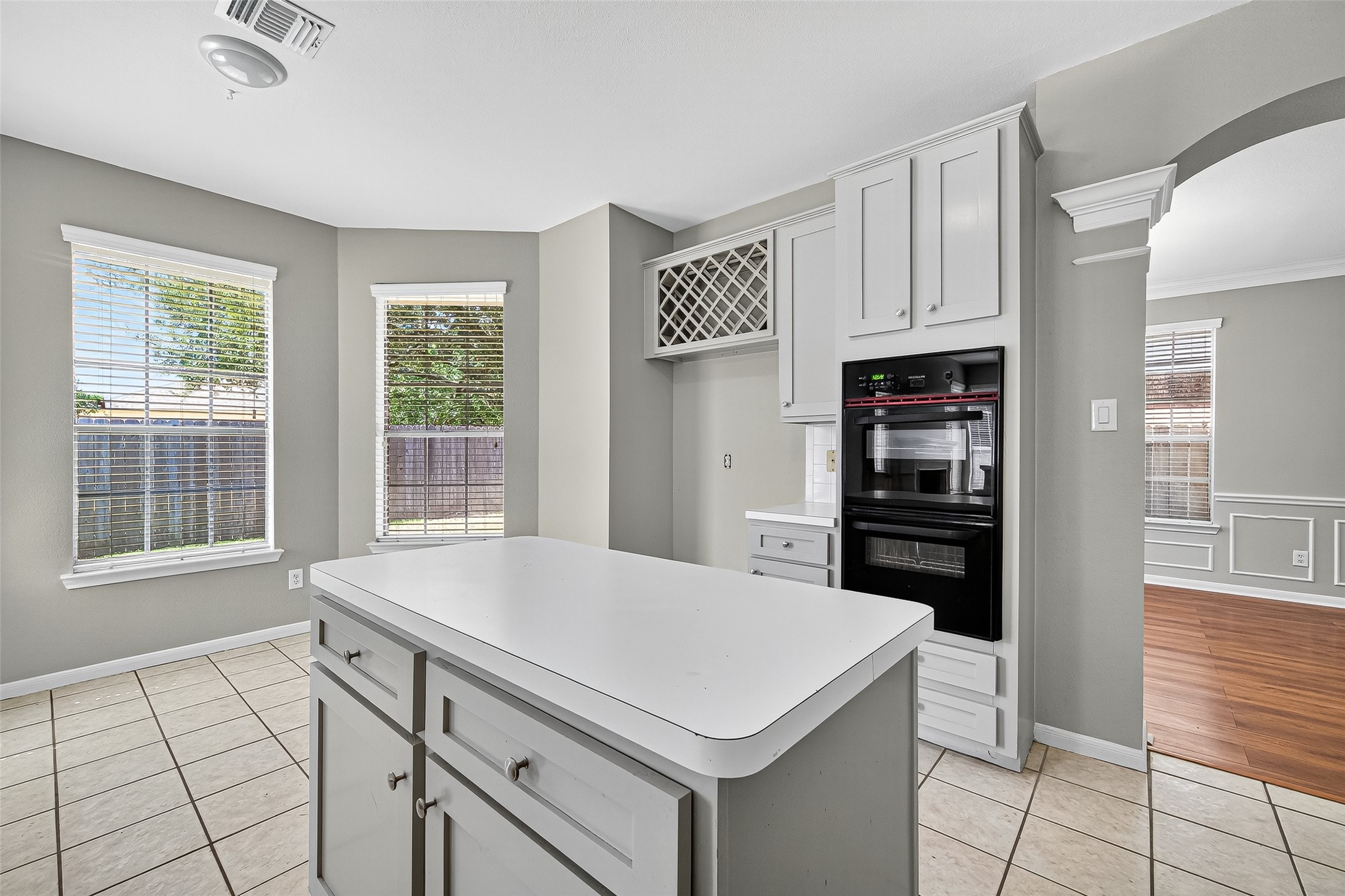 7411 Pacific Ridge Court Houston, TX 77095 - Photo 13 of 50 a kitchen with a stove and a refrigerator