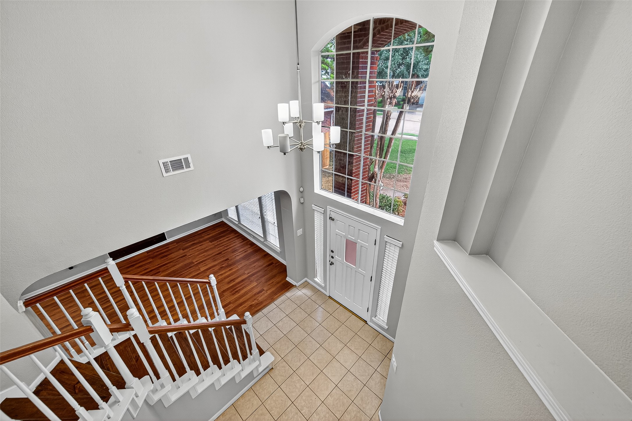 7411 Pacific Ridge Court Houston, TX 77095 - Photo 24 of 50 a view of an entryway with staircase