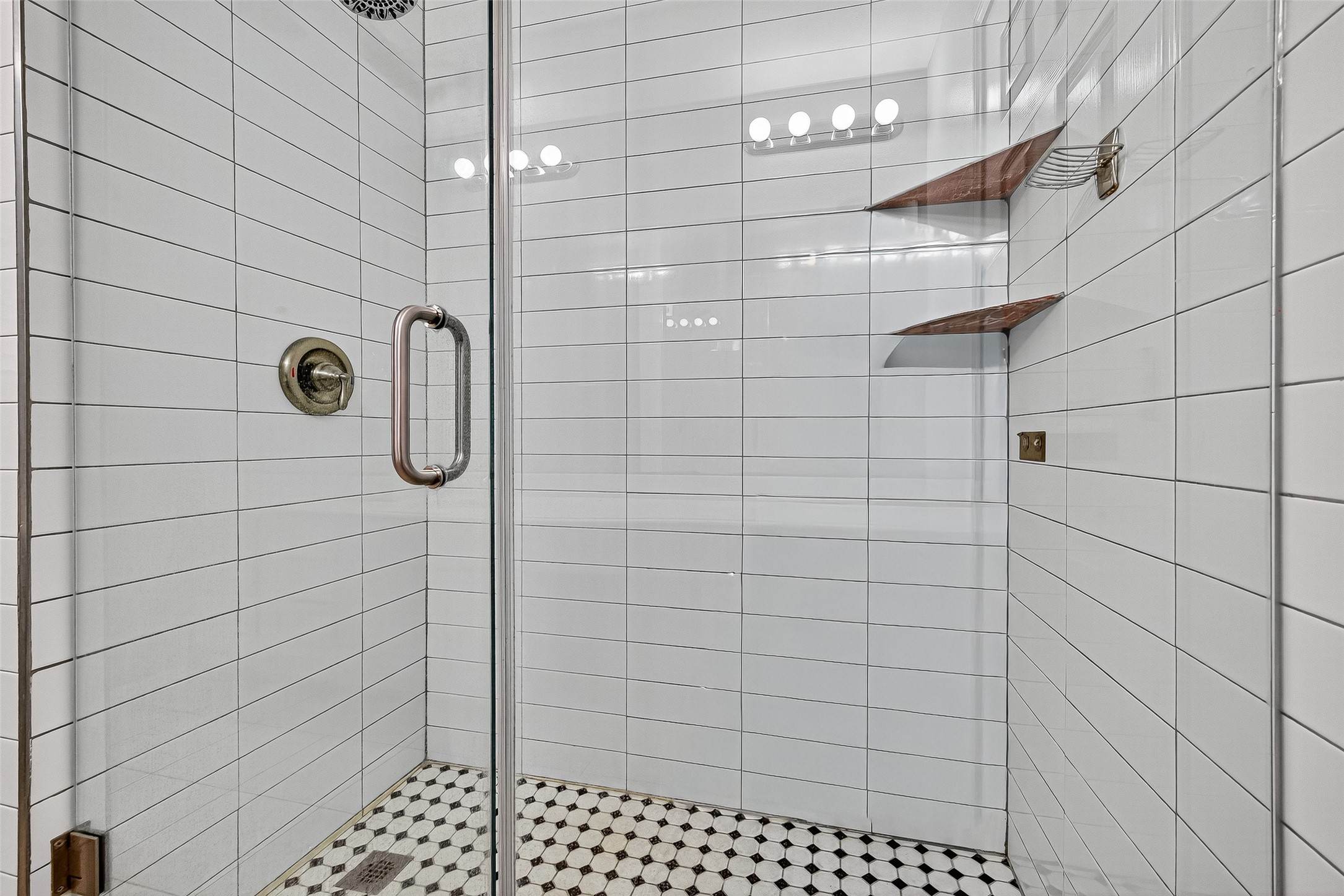 7411 Pacific Ridge Court Houston, TX 77095 - Photo 32 of 50 a bathroom with a shower