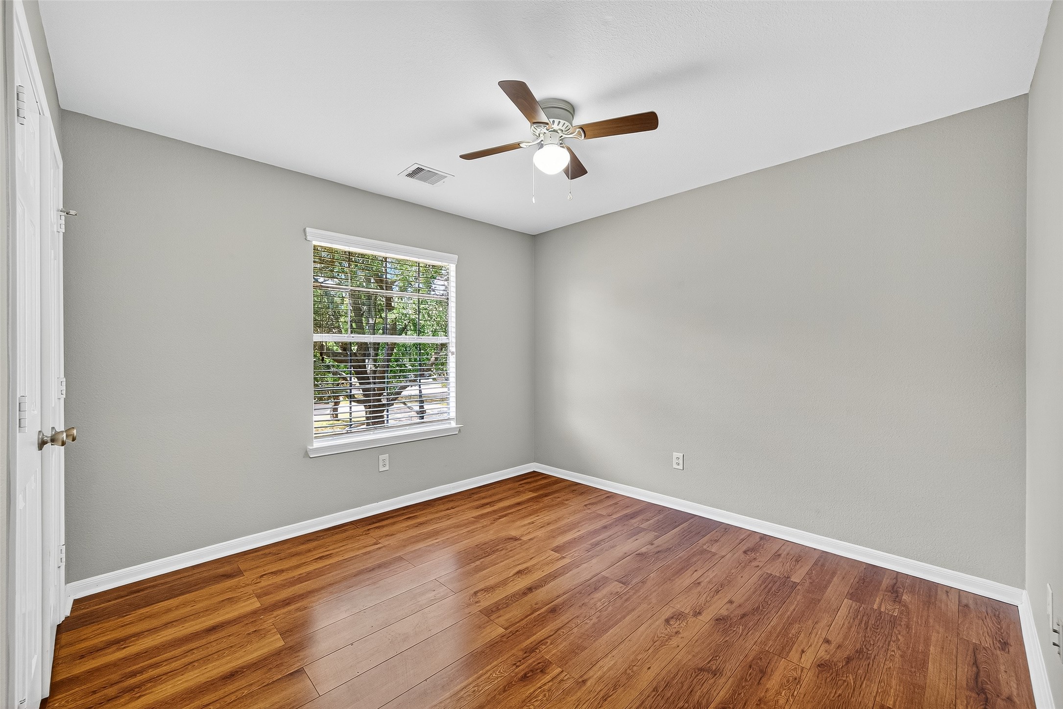 7411 Pacific Ridge Court Houston, TX 77095 - Photo 39 of 50 a view of a big room with wooden floor and windows