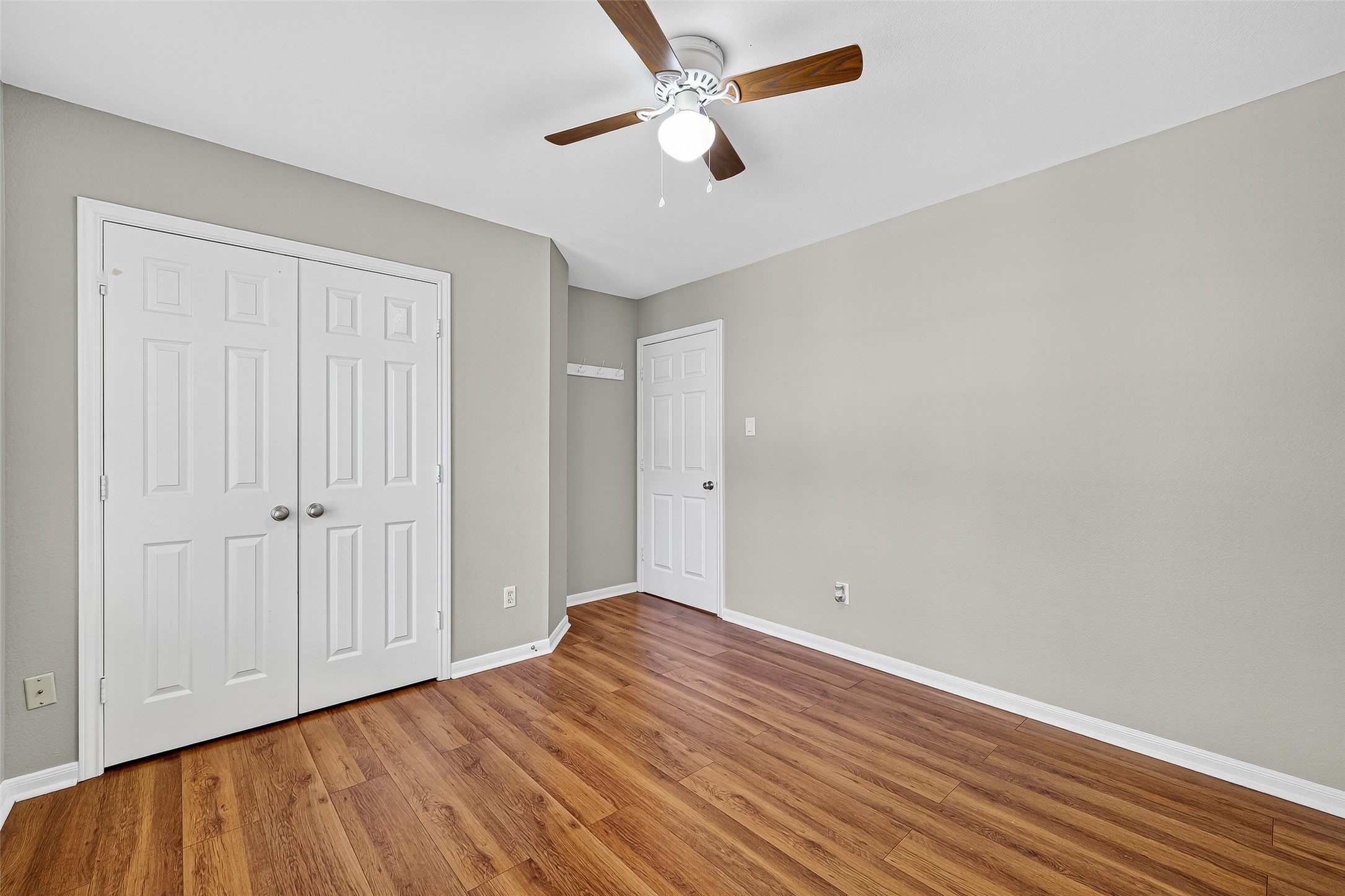 7411 Pacific Ridge Court Houston, TX 77095 - Photo 40 of 50 wooden floor in an empty room