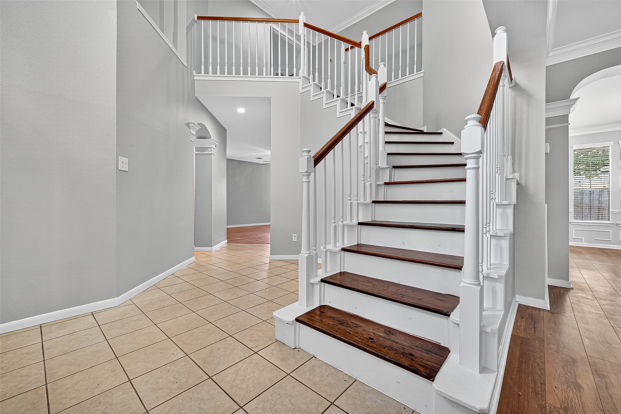 7411 Pacific Ridge Court Houston, TX 77095 - Photo 4 of 50 a view of entryway with wooden floor and front door