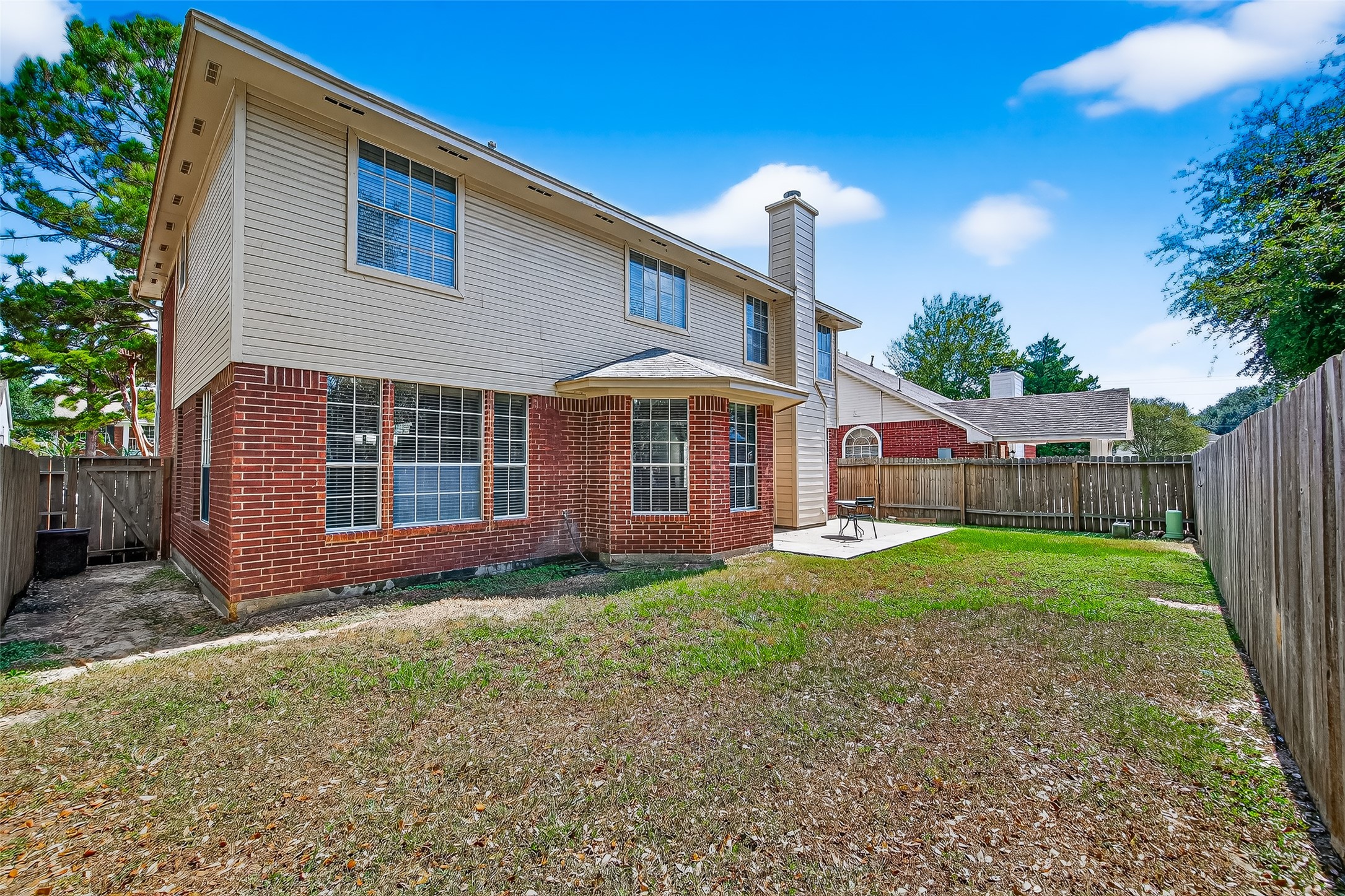7411 Pacific Ridge Court Houston, TX 77095 - Photo 45 of 50 a view of a house with backyard and porch