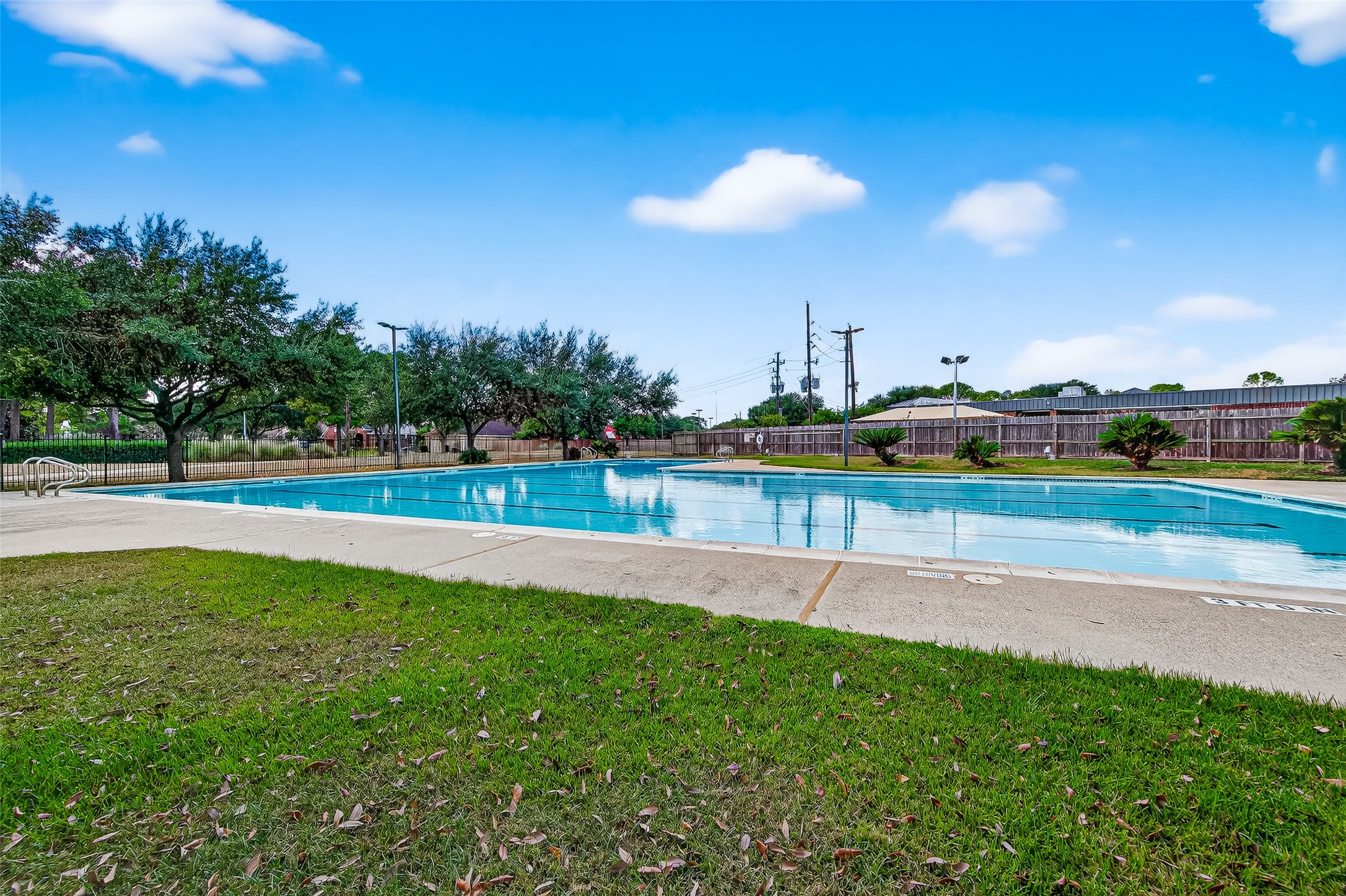 7411 Pacific Ridge Court Houston, TX 77095 - Photo 50 of 50 a view of a golf course with a lake