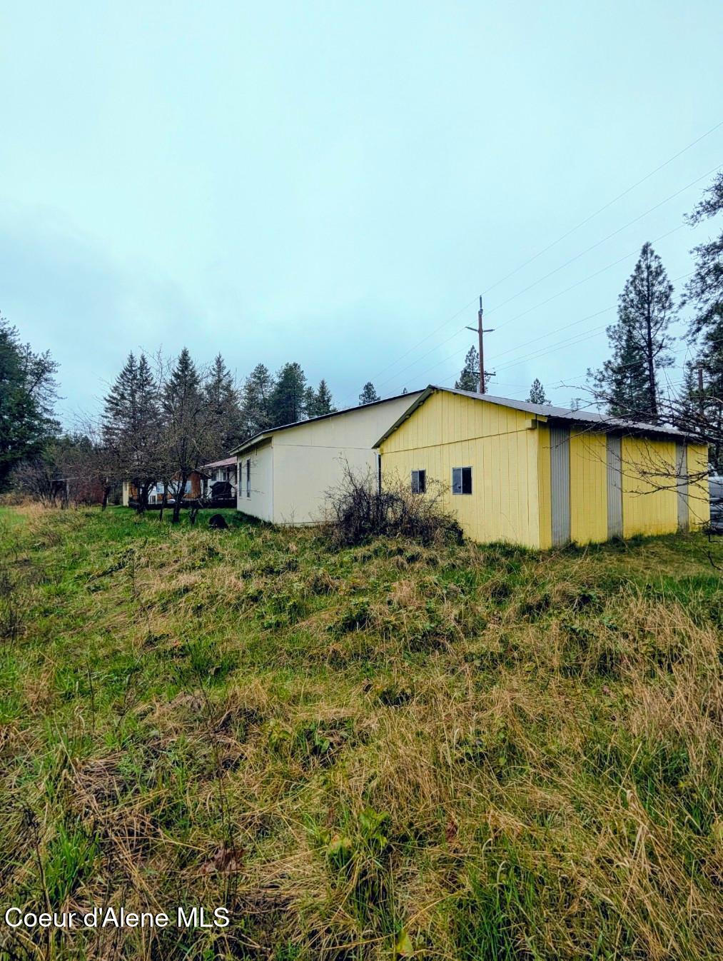968 Roosevelt Road Bonners Ferry, ID 83805 - Photo 27 of 34 Rear view of home