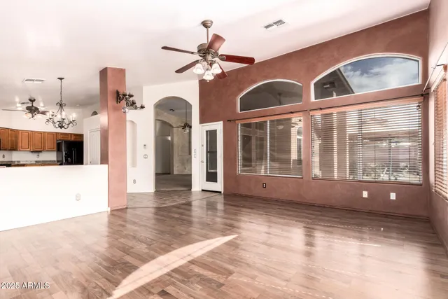 a view of an entryway with wooden floor