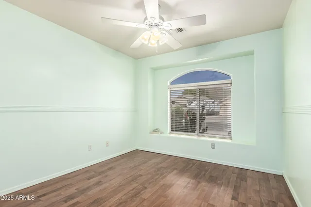 a view of a livingroom with wooden floor