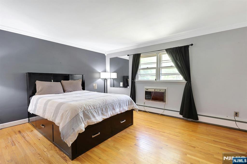 20 Blue Hill Road Norwood, NJ 07648 - Photo 19 of 49 a spacious bedroom with a bed and a window
