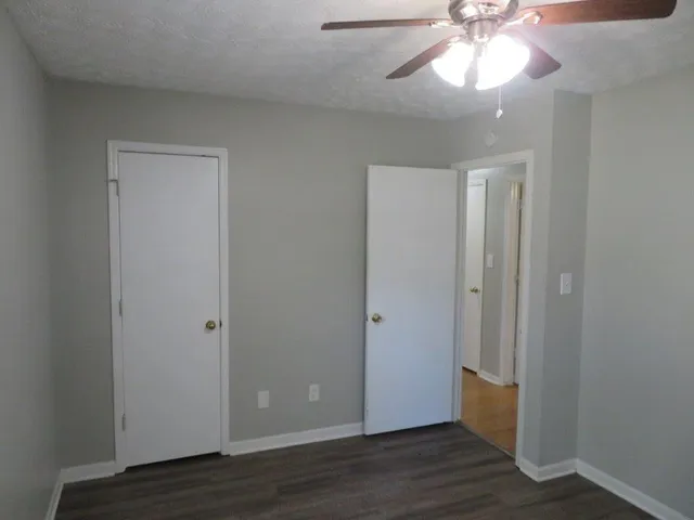 a bathroom with a sink a toilet and bathtub