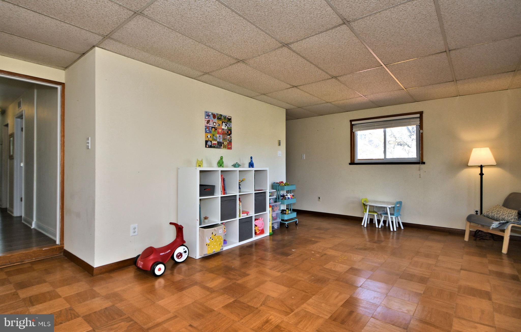 1811 Surrey Road Oreland, PA 19075 - Photo 30 of 48 Family room with hardwood floor