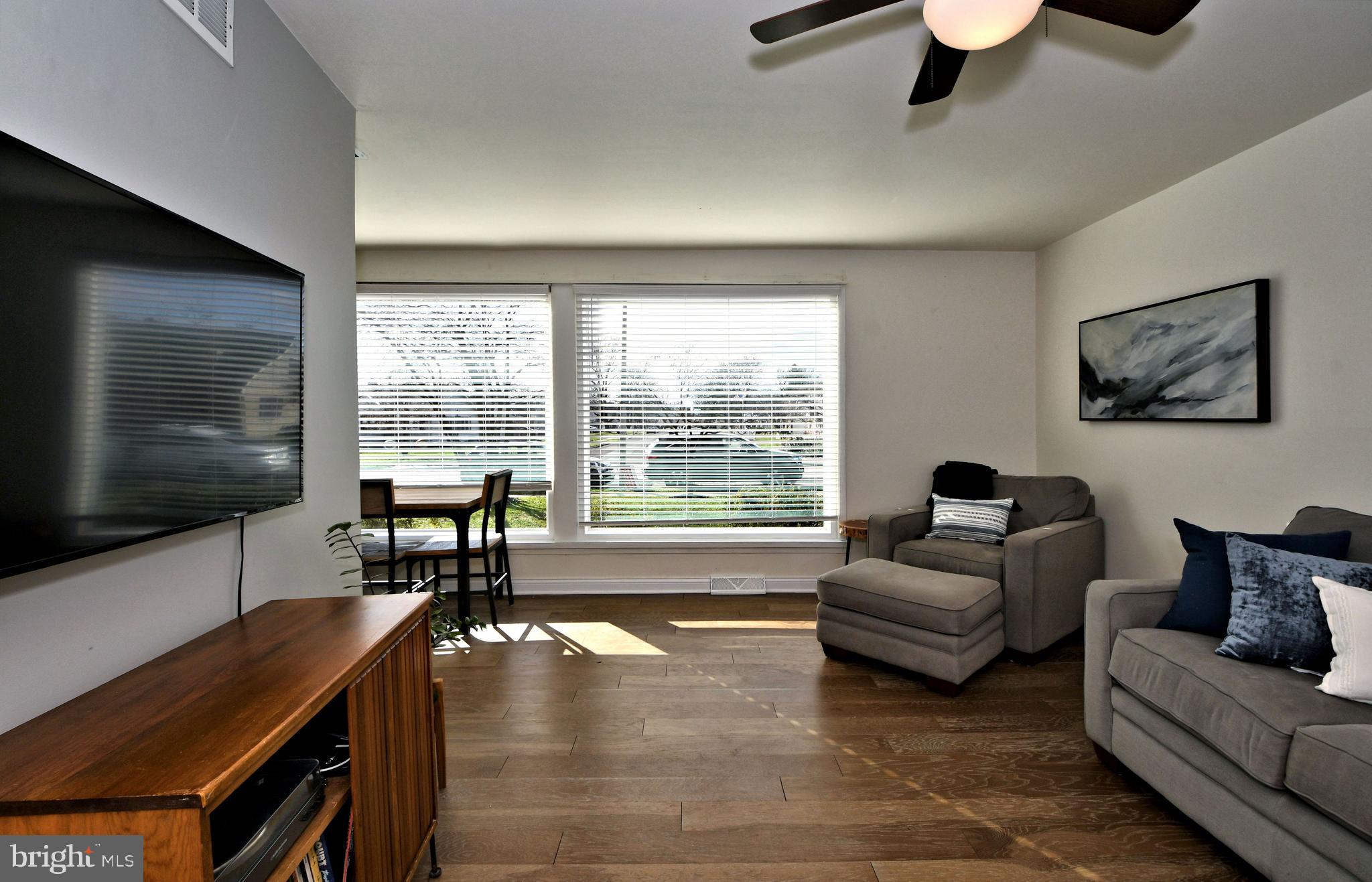 1811 Surrey Road Oreland, PA 19075 - Photo 5 of 48 Living room with wall of windows