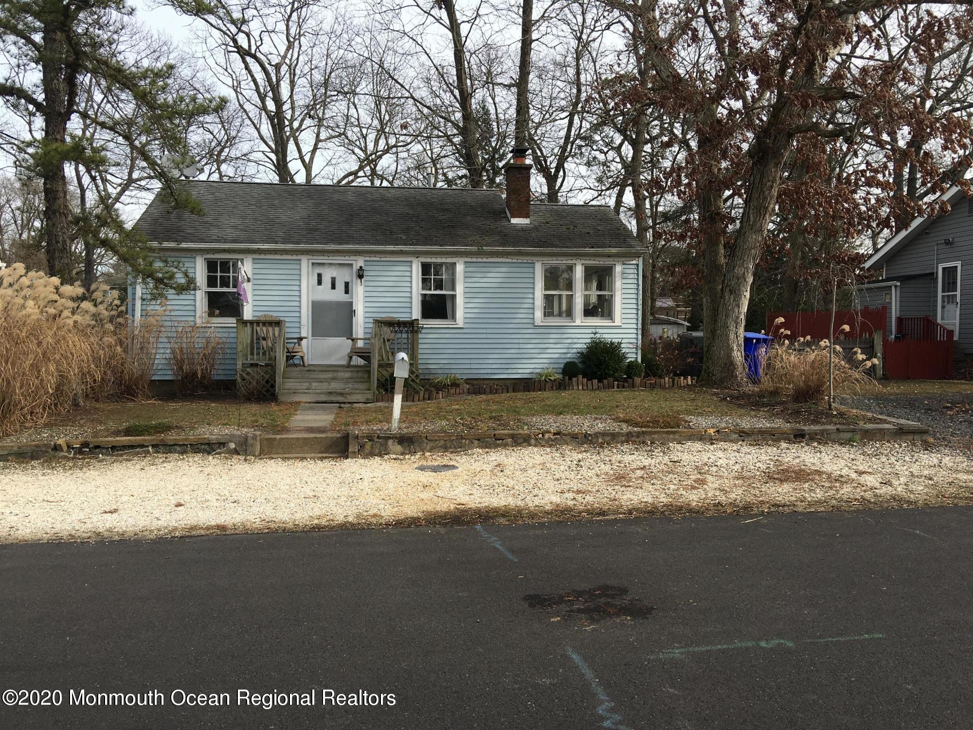 3 Stuyvesant Road Brick, NJ 08723 - Photo 1 of 10 a backyard of a house with yard fire pit and outdoor seating