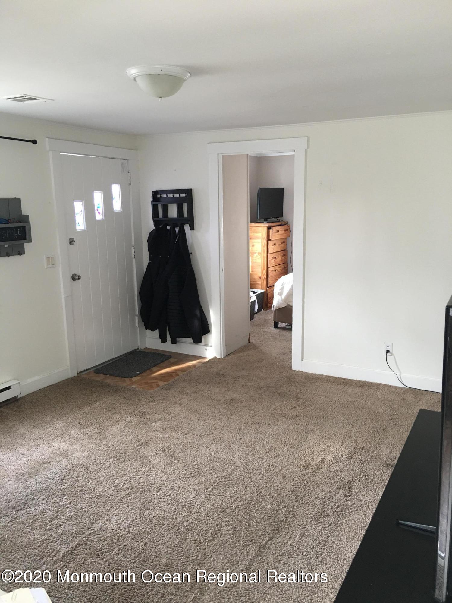 3 Stuyvesant Road Brick, NJ 08723 - Photo 3 of 10 a view of a livingroom with furniture and closet