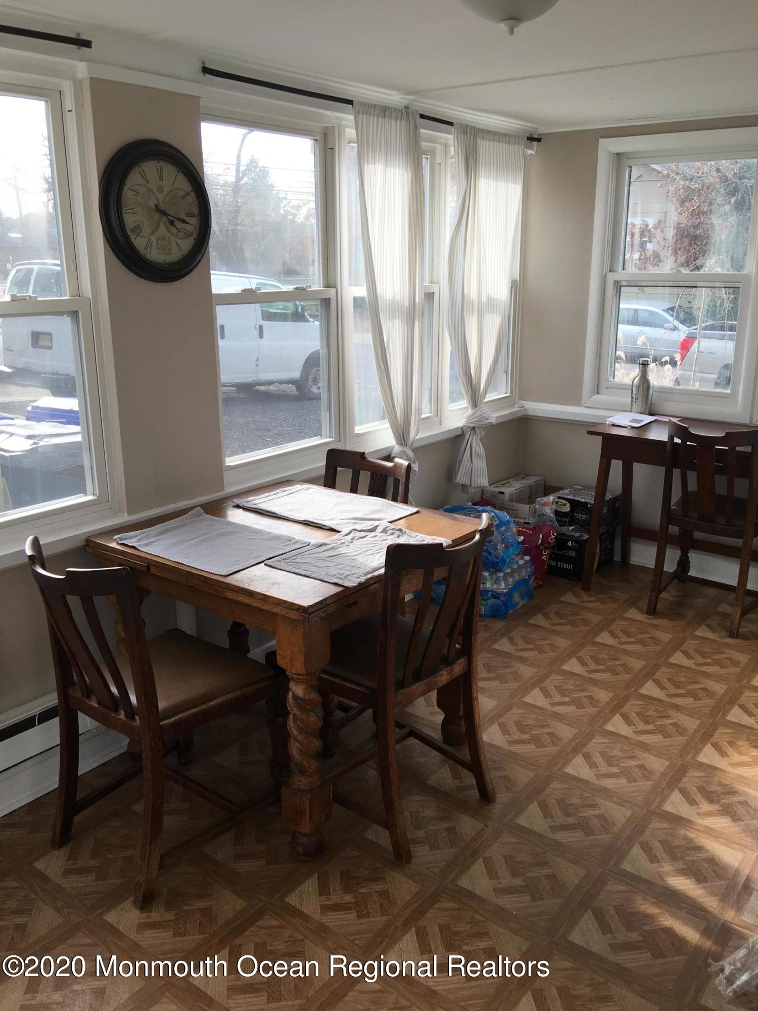 3 Stuyvesant Road Brick, NJ 08723 - Photo 6 of 10 a view of a dining room with furniture and a large window