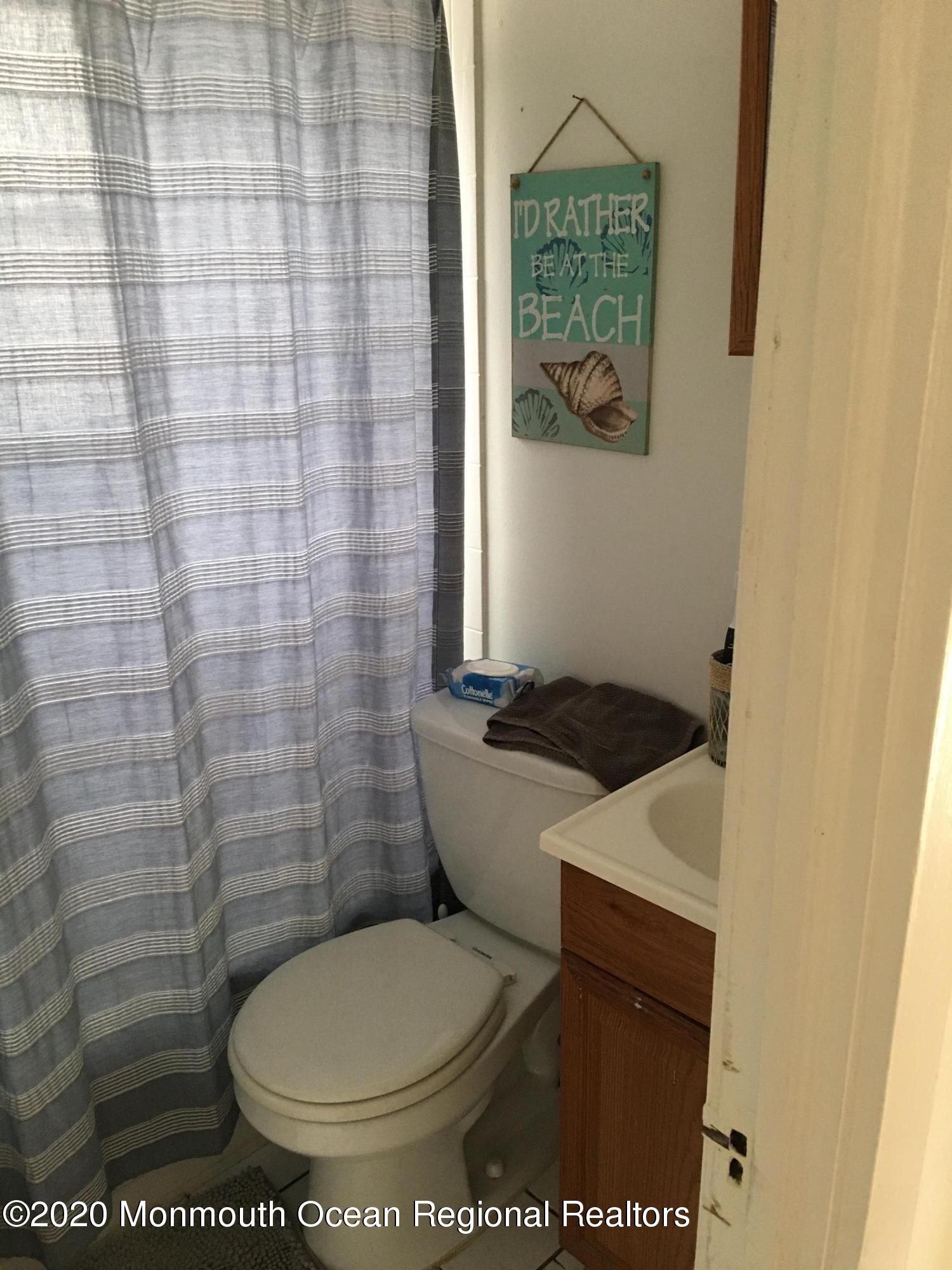 3 Stuyvesant Road Brick, NJ 08723 - Photo 8 of 10 a bathroom with a toilet and a shower