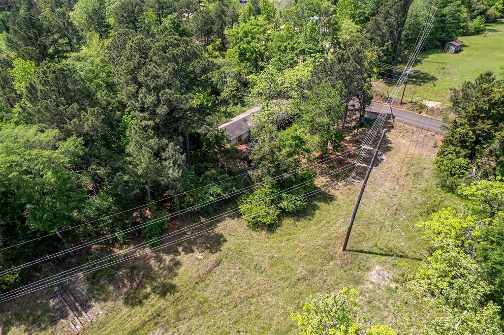 1532 Phillips Springs Road Gladewater, TX 75647 - Photo 2 of 19 a view of a yard