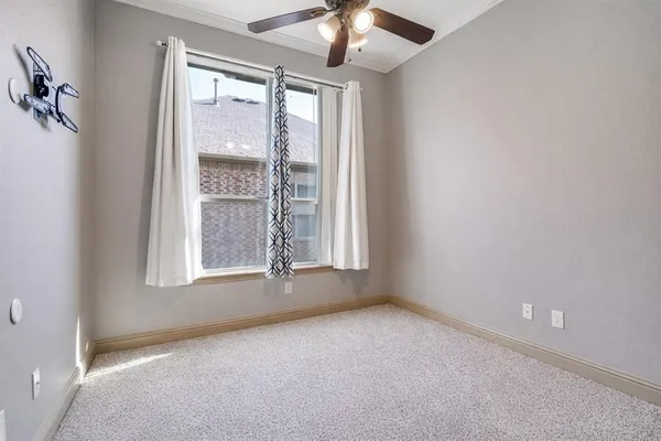 an empty room with a empty space and windows