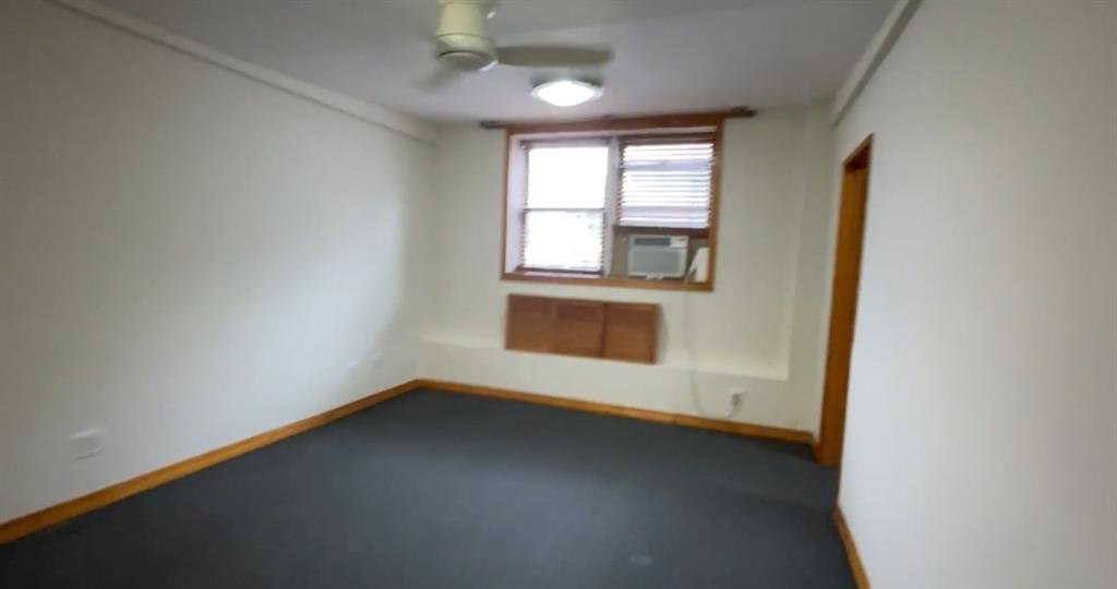 1237 Avenue Z, Unit NN Brooklyn, NY 11235 - Photo 6 of 12 an empty room with a window