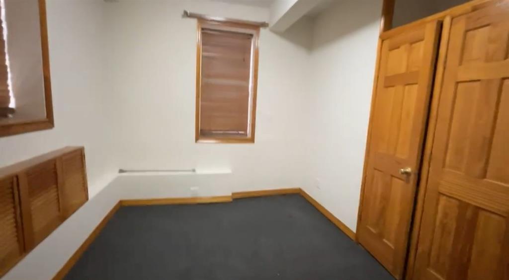 1237 Avenue Z, Unit NN Brooklyn, NY 11235 - Photo 7 of 12 a view of an empty room with a window