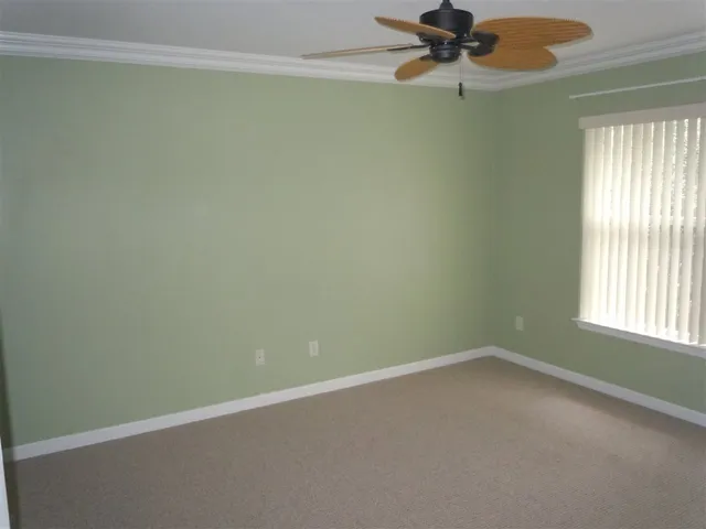 an empty room with a bathroom