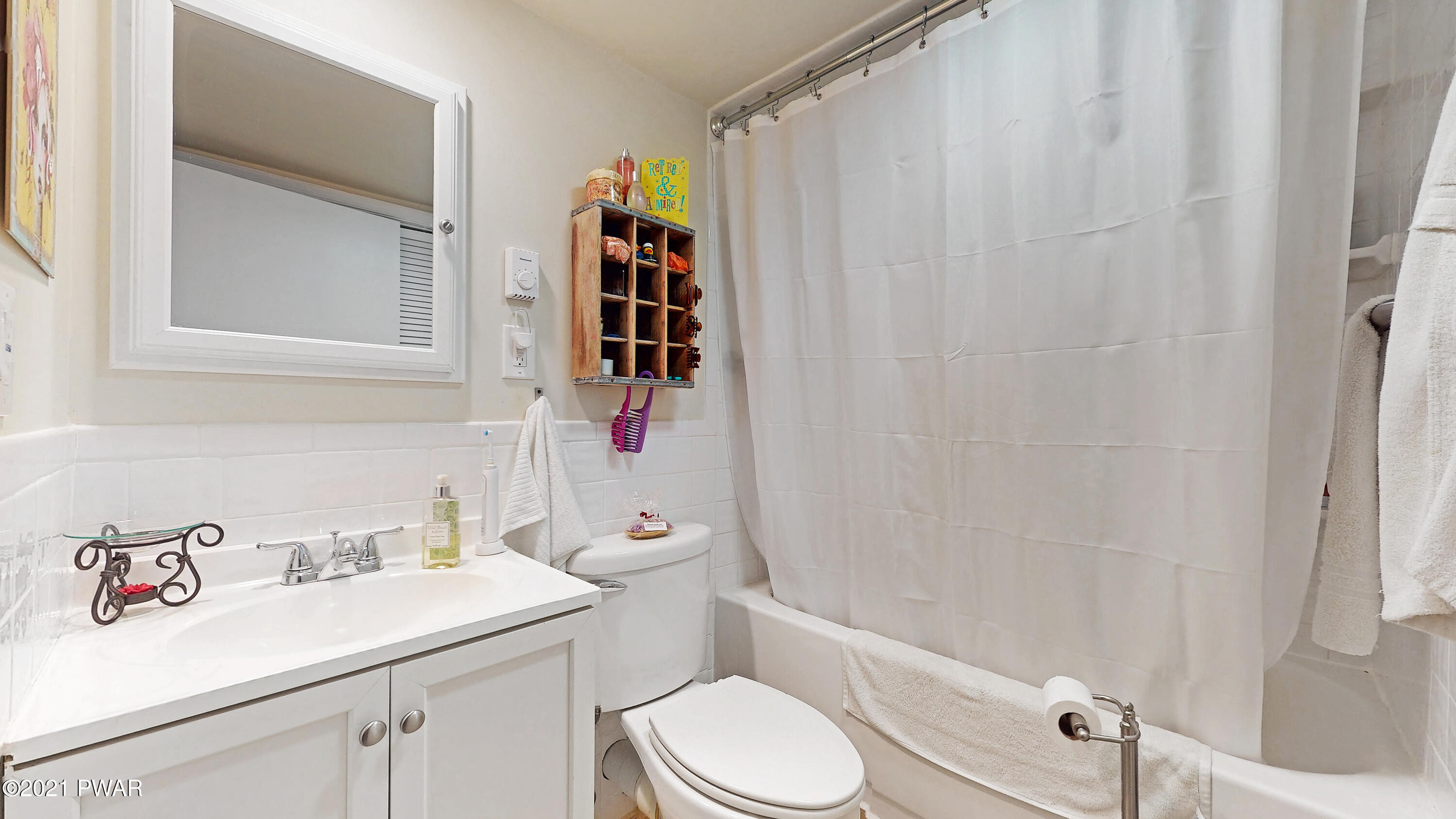 157 Roundhill Road Dingmans Ferry, PA 18328 - Photo 13 of 48 a bathroom with a sink toilet and shower